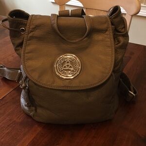 Taupe/khaki green backpack purse. All leather, soft. Quality made. Storage.